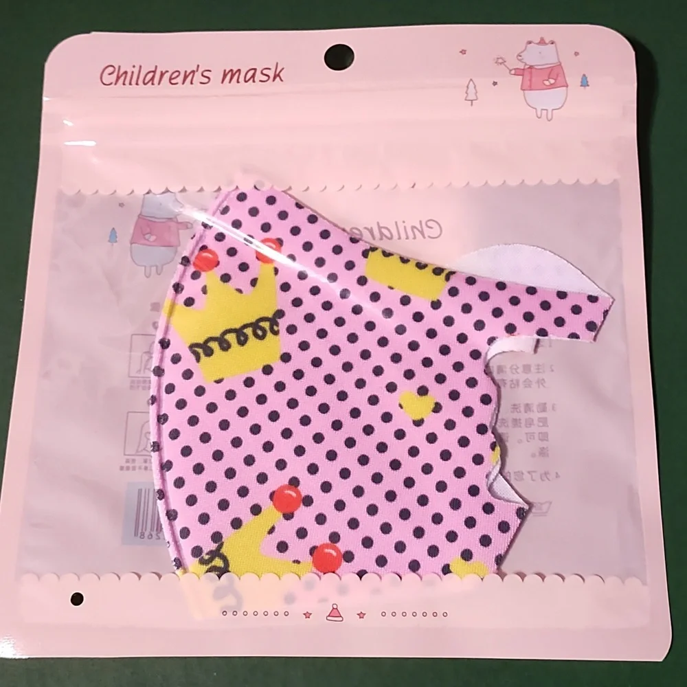 Children's re Usable face mask new in package never opened